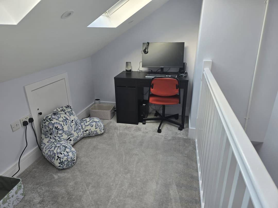 YCN Colney Home loft room with PC setup, bean bag and skylight — dedicated study and gaming space