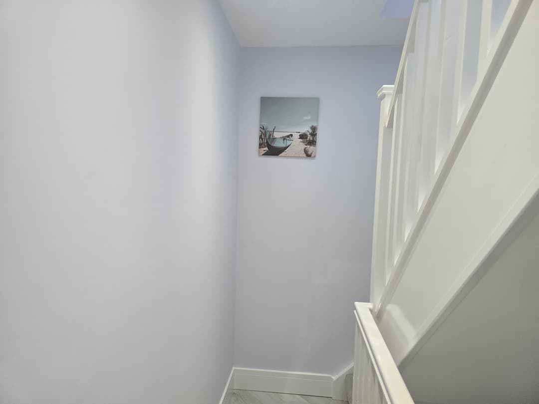 YCN Colney Home bright, clean staircase and hallway — well-maintained throughout